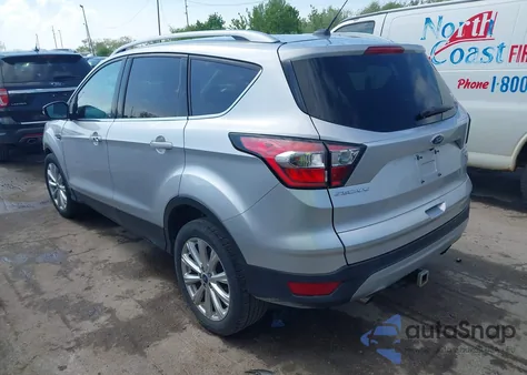 2017 Ford Escape Titanium z USA, uszkodzony, nr VIN 1FMCU0JD0HUD09406